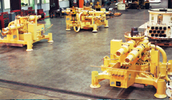 A series of yellow tree systems lined up for product testing at Dril-Quip's Houston Facility