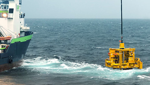 An HXT™ Horizontal Tree being lowered into the sea